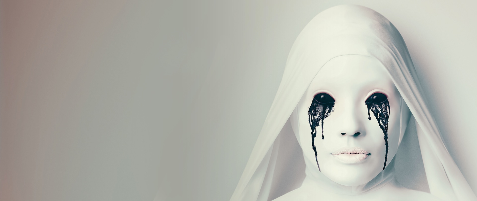 Woman in white nun headdress with white face and neck makeup with full black eyes and black paint running from their eyes